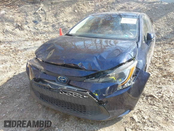 2021 Toyota Corolla Hybrid LE with VIN JTDEAMDEXMJ018053, listed as a IAAI auction lot 41779462 with 60,794 mi miles. Bid and sale history available at carsss.com. Image 6.