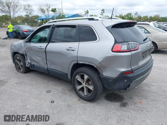 2020 Jeep Cherokee Limited with VIN 1C4PJLDB2LD560723, listed as a IAAI auction lot 41658092 with 73,978 mi miles. Bid and sale history available at carsss.com. Image 3.