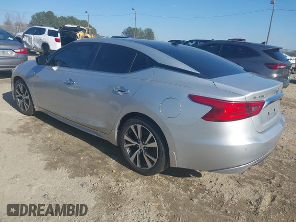 2016 Nissan Maxima SL with VIN 1N4AA6AP6GC448161, listed as a IAAI auction lot 41709077 with 133,288 mi miles and . Bid and sale history available at DreamBid. Image 3.