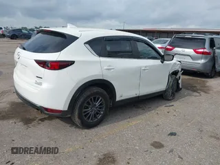 2020 Mazda CX-5 Touring z VIN JM3KFBCM2L0786784, wystawiony jako IAAI lot #42127457 z przebiegiem 62 665 mil mil oraz . Historia ofert i sprzedaży dostępna na DreamBid. Obrazek 4.