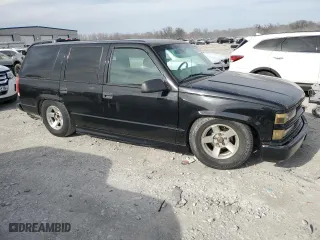 2000 Chevrolet Tahoe Limited with VIN 1GNEC13R8YR160994, listed as a Copart auction lot 49612635 with 207,062 mi miles and Salvage Title. Bid and sale history available at carsss.com. Image 4.