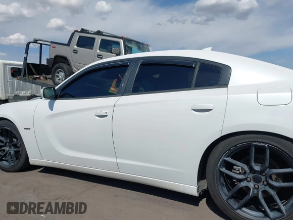 2015 Dodge Charger RT z VIN 2C3CDXCT4FH745861, wystawiony jako IAAI lot #42206349 z przebiegiem 136 061 mil mil oraz . Historia ofert i sprzedaży dostępna na DreamBid. Obrazek 14.