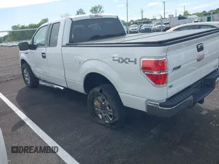 2012 Ford F-150 XL with VIN 1FTFX1EF1CFB32694, listed as a IAAI auction lot 42048993 with 144,091 mi miles. Bid and sale history available at carsss.com. Image 3.