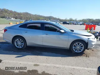 2018 Chevrolet Malibu LT z VIN 1G1ZD5ST1JF261841, wystawiony jako IAAI lot #41887177 z przebiegiem 128 213 mil mil oraz . Historia ofert i sprzedaży dostępna na DreamBid. Obrazek 14.