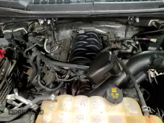 2017 Ford F-150 XL z VIN 1FTEW1EF9HFB49488, wystawiony jako Copart lot #86115165 z przebiegiem 149 762 mil mil oraz Czysty tytuł • Clean title. Historia ofert i sprzedaży dostępna na DreamBid. Obrazek 13.