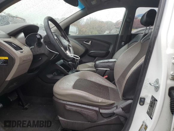 2013 Hyundai Tucson GLS with VIN KM8JU3AC0DU770079, listed as a Copart auction lot 52639835 with 212,894 mi miles and Clean Title. Bid and sale history available at carsss.com. Image 7.