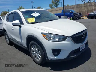 2014 Mazda CX-5 Touring with VIN JM3KE2CY7E0349632, listed as a IAAI auction lot 42671449 with 79,947 mi miles and . Bid and sale history available at DreamBid. Image 1.