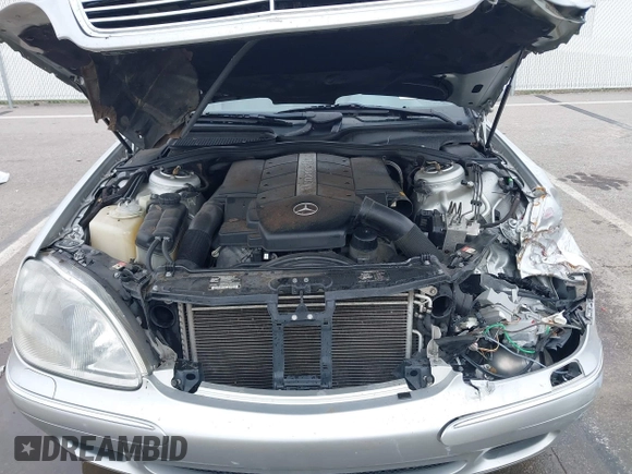 2000 Mercedes-Benz S-Class with VIN WDBNG70JXYA054073, listed as a IAAI auction lot 41987179 with 124,968 mi miles. Bid and sale history available at carsss.com. Image 10.