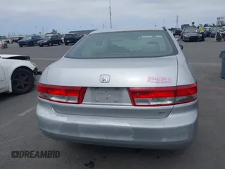 2003 Honda Accord EX z VIN JHMCM56673C058909, wystawiony jako IAAI lot #42458833 z przebiegiem 164 589 mil mil oraz . Historia ofert i sprzedaży dostępna na DreamBid. Obrazek 16.