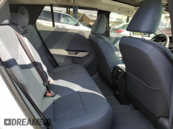 2023 Lexus RZ 450e Premium z VIN JTJAAAAB7PA021503, wystawiony jako Copart lot #41259754 z przebiegiem 1150 mil mil oraz . Historia ofert i sprzedaży dostępna na DreamBid. Obrazek 10.