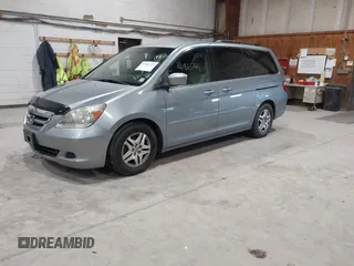 2006 Honda Odyssey EX with VIN 5FNRL38456B101102, listed as a IAAI auction lot 41861721 with 232,819 mi miles. Bid and sale history available at carsss.com. Image 2.
