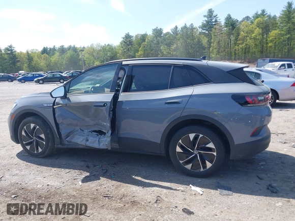 2022 Volkswagen ID.4 Pro S z VIN WVGGNPE24NP059968, wystawiony jako IAAI lot #42210089 z przebiegiem 36 860 mil mil oraz . Historia ofert i sprzedaży dostępna na DreamBid. Obrazek 14.