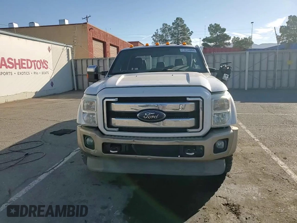 2014 Ford F-450 XL with VIN 1FT8W4DT4EEA08741, listed as a Copart auction lot 77214904 with 168,838 mi miles and Salvage title. Bid and sale history available at DreamBid. Image 11.