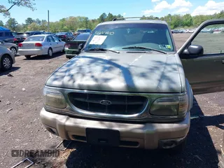 1999 Ford Explorer XLT с VIN 1FMDU34E2XUA07544, выставлен на аукционе IAAI как лот 42211210 с пробегом 156 786 миль миль и . История ставок и продаж доступна на DreamBid. Изображение 6.