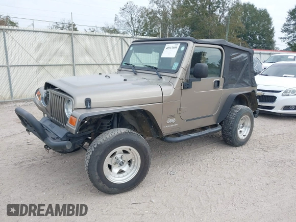 2003 Jeep Wrangler SE with VIN 1J4FA29113P304250, listed as a IAAI auction lot 40917099 with 191,589 mi miles. Bid and sale history available at carsss.com. Image 17.