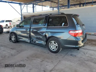 2006 Honda Odyssey EX with VIN 5FNRL384X6B461661, listed as a Copart auction lot 61051915 with 190,578 mi miles and Salvage title. Bid and sale history available at DreamBid. Image 2.