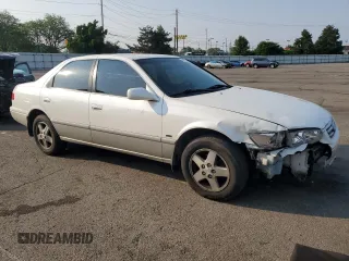 2001 Toyota Camry LE z VIN JT2BF22K010297055, wystawiony jako Copart lot #59510645 z przebiegiem 265 428 mil mil oraz Szkoda całkowita • Salvage title. Historia ofert i sprzedaży dostępna na DreamBid. Obrazek 4.