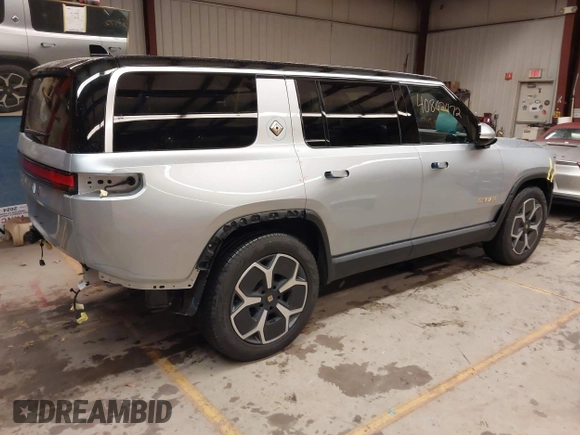 2024 Rivian R1S Adventure with VIN 7PDSGABA9RN039601, listed as a IAAI auction lot 40862472 with 6,186 mi miles. Bid and sale history available at carsss.com. Image 14.
