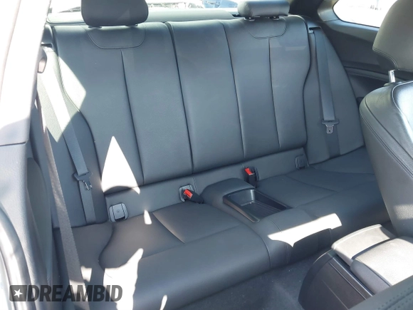 2016 BMW 2 Series M235i with VIN WBA1J7C5XGV359562, listed as a IAAI auction lot 39990299 with 54,022 mi miles. Bid and sale history available at carsss.com. Image 8.