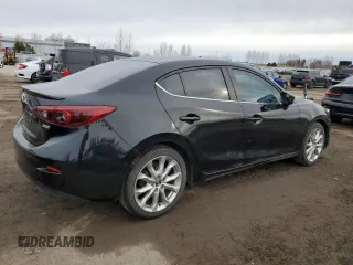 2014 Mazda 3 S Grand Touring with VIN JM1BM1W33E1198031, listed as a Copart auction lot 50879285 with 130,661 mi miles and Salvage Title. Bid and sale history available at DreamBid. Image 3.