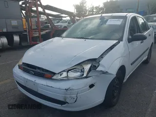 2000 Ford Focus LX with VIN 1FAFP33P3YW254784, listed as a IAAI auction lot 41429406 with 88,572 mi miles and . Bid and sale history available at carsss.com. Image 6.