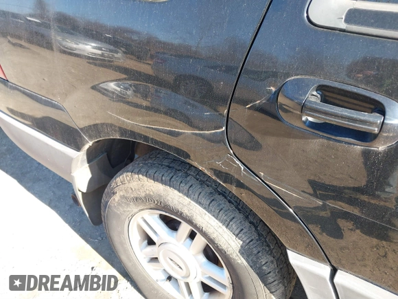 2004 Ford Expedition XLT with VIN 1FMPU16WX4LB12891, listed as a IAAI auction lot 41695636 with 209,574 mi miles. Bid and sale history available at carsss.com. Image 13.
