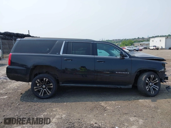 2015 Chevrolet Suburban LT with VIN 1GNSKJKC4FR222178, listed as a IAAI auction lot 42423080 with 234,870 mi miles and . Bid and sale history available at DreamBid. Image 13.
