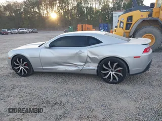 2014 Chevrolet Camaro LT z VIN 2G1FC1E36E9259754, wystawiony jako IAAI lot #41864556 z przebiegiem 118 443 mil mil oraz . Historia ofert i sprzedaży dostępna na DreamBid. Obrazek 14.