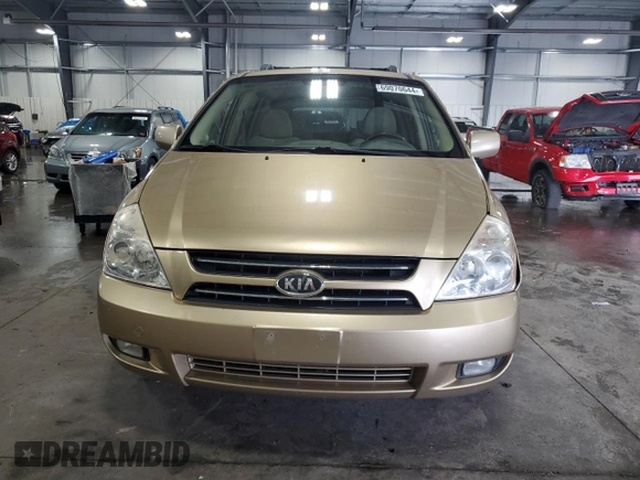 2006 Kia Sedona LX with VIN KNDMB233666082464, listed as a Copart auction lot 69070644 with 244,445 mi miles and Salvage Title. Bid and sale history available at carsss.com. Image 5.