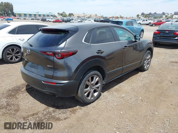 2021 Mazda CX-30 Select with VIN 3MVDMABL5MM210517, listed as a IAAI auction lot 42245033 with 191,303 mi miles and . Bid and sale history available at DreamBid. Image 4.