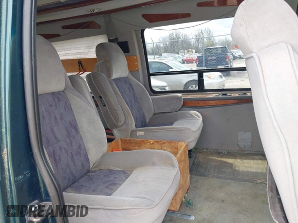 1999 Ford Econoline Cargo with VIN 1FDRE14W4XHC30466, listed as a IAAI auction lot 41935293 with 276,092 mi miles. Bid and sale history available at carsss.com. Image 8.