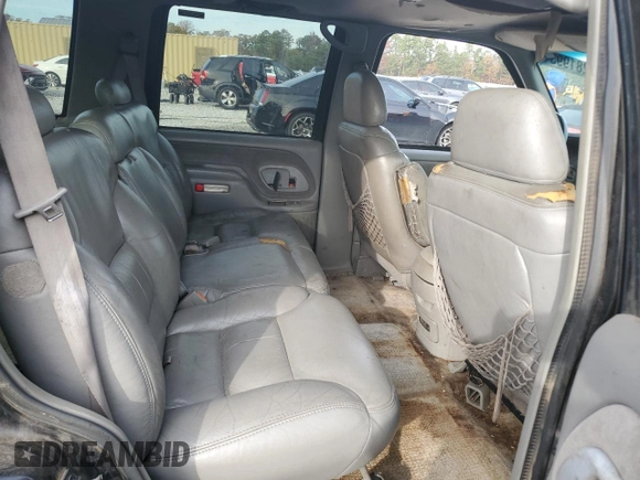 1999 GMC Yukon with VIN 1GKEC13R7XJ802387, listed as a Copart auction lot 82819934 with 438,574 mi miles and Salvage Title. Bid and sale history available at carsss.com. Image 11.