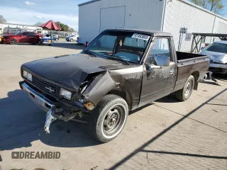 1982 Datsun 720 z VIN JN6MD01S3CW124932, wystawiony jako Copart lot #47493805 z przebiegiem 161 654 mil mil oraz Szkody całkowita. Historia ofert i sprzedaży dostępna na DreamBid. Obrazek 1.