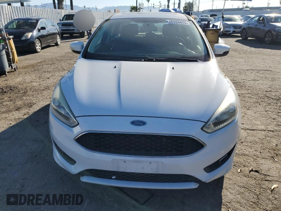 2015 Ford Focus SE with VIN 1FADP3K29FL334599, listed as a Copart auction lot 46926475 with 127,537 mi miles and Salvage Title. Bid and sale history available at DreamBid. Image 5.