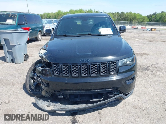 2019 Jeep Grand Cherokee Altitude with VIN 1C4RJFAG8KC808309, listed as a IAAI auction lot 41977457 with 122,923 mi miles and . Bid and sale history available at DreamBid. Image 12.