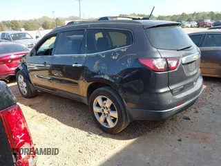 2017 Chevrolet Traverse LT with VIN 1GNKRGKDXHJ196713, listed as a IAAI auction lot 41913435 with 141,319 mi miles and . Bid and sale history available at DreamBid. Image 3.