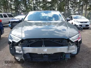 2017 Audi A3 Premium z VIN WAUAUGFF6H1044150, wystawiony jako IAAI lot #42002615 z przebiegiem 60 371 mil mil oraz . Historia ofert i sprzedaży dostępna na DreamBid. Obrazek 13.