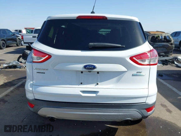 2015 Ford Escape z VIN 1FMTU0G90FUA81004, wystawiony jako IAAI lot #42261648 z przebiegiem 169 989 mil mil oraz . Historia ofert i sprzedaży dostępna na DreamBid. Obrazek 17.