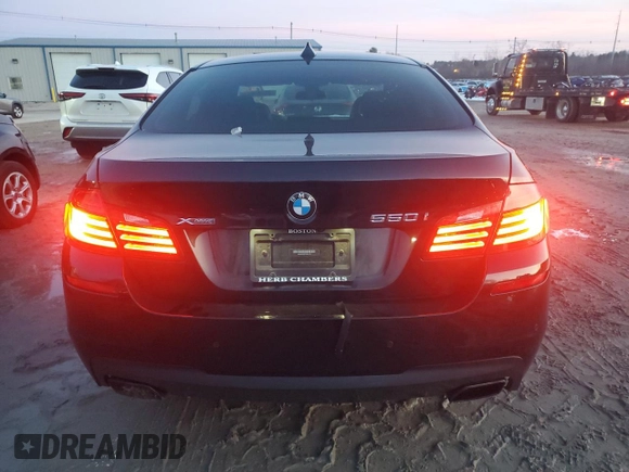 2016 BMW 5 Series 550i xDrive with VIN WBAKP9C52GD981190, listed as a Copart auction lot 85248244 with 90,962 mi miles and Salvage title. Bid and sale history available at DreamBid. Image 6.