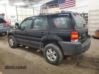 2005 Ford Escape XLS Value with VIN 1FMYU92Z05DA10448, listed as a Copart auction lot 54438955 with 185,303 mi miles and Salvage title. Bid and sale history available at DreamBid. Image 2.