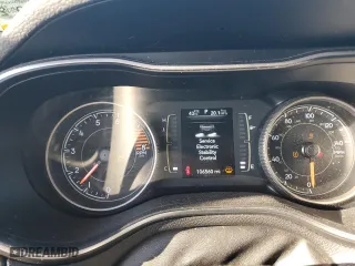 2019 Jeep Cherokee Altitude with VIN 1C4PJLLX2KD435104, listed as a Copart auction lot 77148084 with 106,560 mi miles and Salvage Title. Bid and sale history available at carsss.com. Image 9.