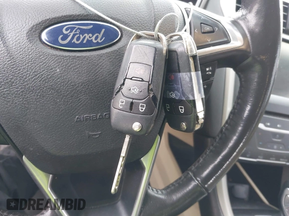 2015 Ford Fusion SE Hybrid with VIN 3FA6P0LU8FR172313, listed as a IAAI auction lot 41556556 with 152,567 mi miles. Bid and sale history available at carsss.com. Image 11.