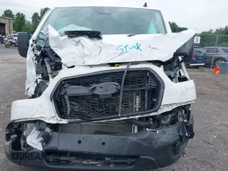 2023 Ford Transit Passenger XL with VIN 1FBAX9Y83PKC08567, listed as a IAAI auction lot 39883261 with 15,028 mi miles and . Bid and sale history available at DreamBid. Image 6.