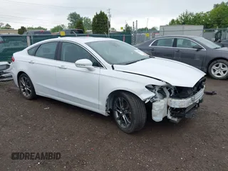 2020 Ford Fusion Titanium with VIN 3FA6P0RUXLR139574, listed as a IAAI auction lot 42299070 with 92,751 mi miles and . Bid and sale history available at DreamBid. Image 1.