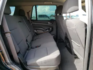 2019 Chevrolet Tahoe LS z VIN 1GNSKAKC8KR399407, wystawiony jako Copart lot #55696355 z przebiegiem 83 903 mil mil oraz Szkoda całkowita • Salvage title. Historia ofert i sprzedaży dostępna na DreamBid. Obrazek 11.