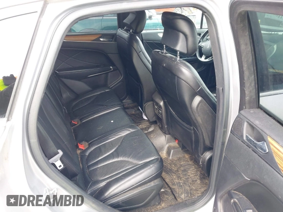2015 Lincoln MKC with VIN 5LMTJ2AH6FUJ10863, listed as a IAAI auction lot 41983116 with 111,250 mi miles. Bid and sale history available at carsss.com. Image 8.
