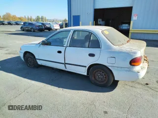 1997 Hyundai Accent z VIN KMHVF24NXVU373676, wystawiony jako Copart lot #77866484 z przebiegiem 151 949 mil mil oraz Tytuł czysty. Historia ofert i sprzedaży dostępna na DreamBid. Obrazek 2.