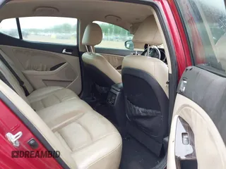 2014 Kia Optima EX z VIN 5XXGN4A76EG281195, wystawiony jako IAAI lot #41875540 z przebiegiem 131 751 mil mil oraz . Historia ofert i sprzedaży dostępna na DreamBid. Obrazek 8.