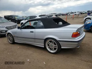 1998 BMW 3 Series 323i with VIN WBABJ8332WEM22760, listed as a Copart auction lot 59631805 with 77,300 mi miles and Salvage title. Bid and sale history available at DreamBid. Image 2.
