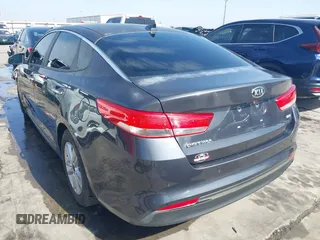 2016 Kia Optima LX Turbo with VIN 5XXGT4L12GG030448, listed as a IAAI auction lot 41744309 with 110,375 mi miles. Bid and sale history available at carsss.com. Image 3.